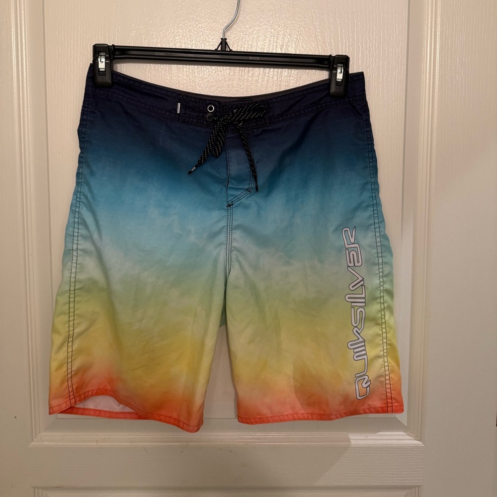 Quiksilver Blue and Orange Swim Trunks for Active Beach Days
